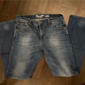 Men’s Wrangler medium/dark wash jeans